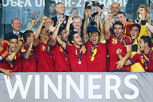 Spain's captain Thiago Alcantara lifts the trophy after winning the UEFA European U21 Championship final match against Italy at Teddy Stadium in Jerusalem, Israel on Tuesday