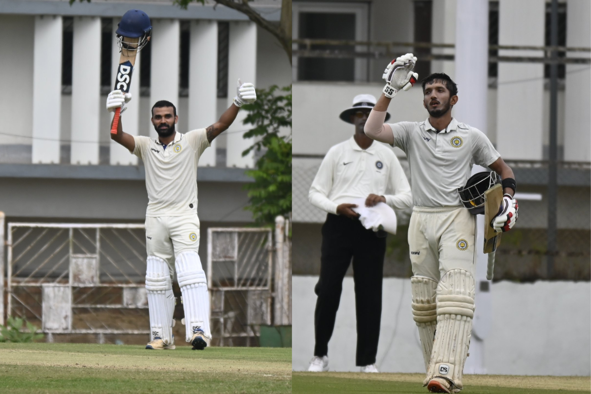 Goa's Snehal Kauthankar and Kashyap Bakle celebrate on reaching their respective triple centuries against Arunachal Pradesh in their Ranji Trophy Plate Division match in Porvorim, Goa, on Thursday