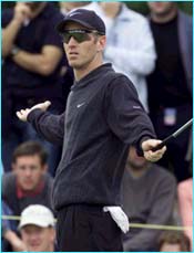 David Duval reacts after missing a putt
